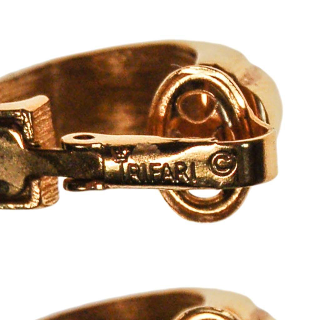 Crown Trifari Gold Ribbed Hoop Earrings by Crown Trifari - Vintage Meet Modern Vintage Jewelry - Chicago, Illinois - #oldhollywoodglamour #vintagemeetmodern #designervintage #jewelrybox #antiquejewelry #vintagejewelry