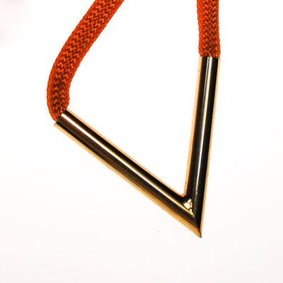 Diane von Furstenberg Orange Silk Cord Gold Triangle Necklace by Diane von Furstenberg - Vintage Meet Modern Vintage Jewelry - Chicago, Illinois - #oldhollywoodglamour #vintagemeetmodern #designervintage #jewelrybox #antiquejewelry #vintagejewelry