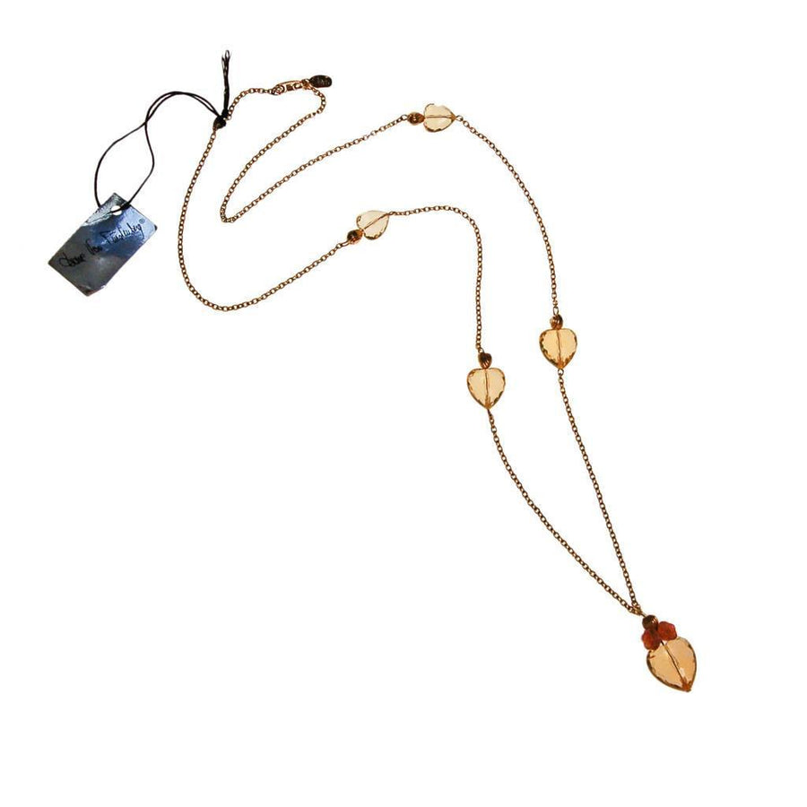Diane von Furstenberg Golden Crystal Heart Necklace by Diane von Furstenberg - Vintage Meet Modern Vintage Jewelry - Chicago, Illinois - #oldhollywoodglamour #vintagemeetmodern #designervintage #jewelrybox #antiquejewelry #vintagejewelry