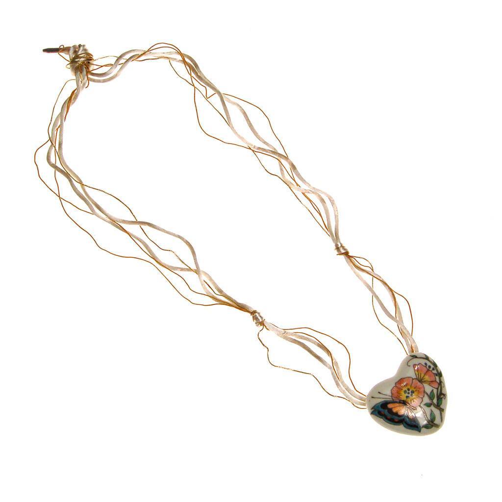 Diane Von Furstenberg Hand Painted Heart Pendant Statement Necklace by Diane von Furstenberg - Vintage Meet Modern Vintage Jewelry - Chicago, Illinois - #oldhollywoodglamour #vintagemeetmodern #designervintage #jewelrybox #antiquejewelry #vintagejewelry