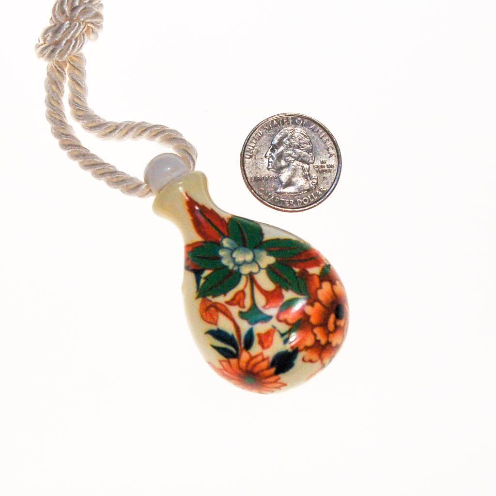 Diane von Furstenberg Floral Urn Pendant Statement Necklace by Diane von Furstenberg - Vintage Meet Modern Vintage Jewelry - Chicago, Illinois - #oldhollywoodglamour #vintagemeetmodern #designervintage #jewelrybox #antiquejewelry #vintagejewelry