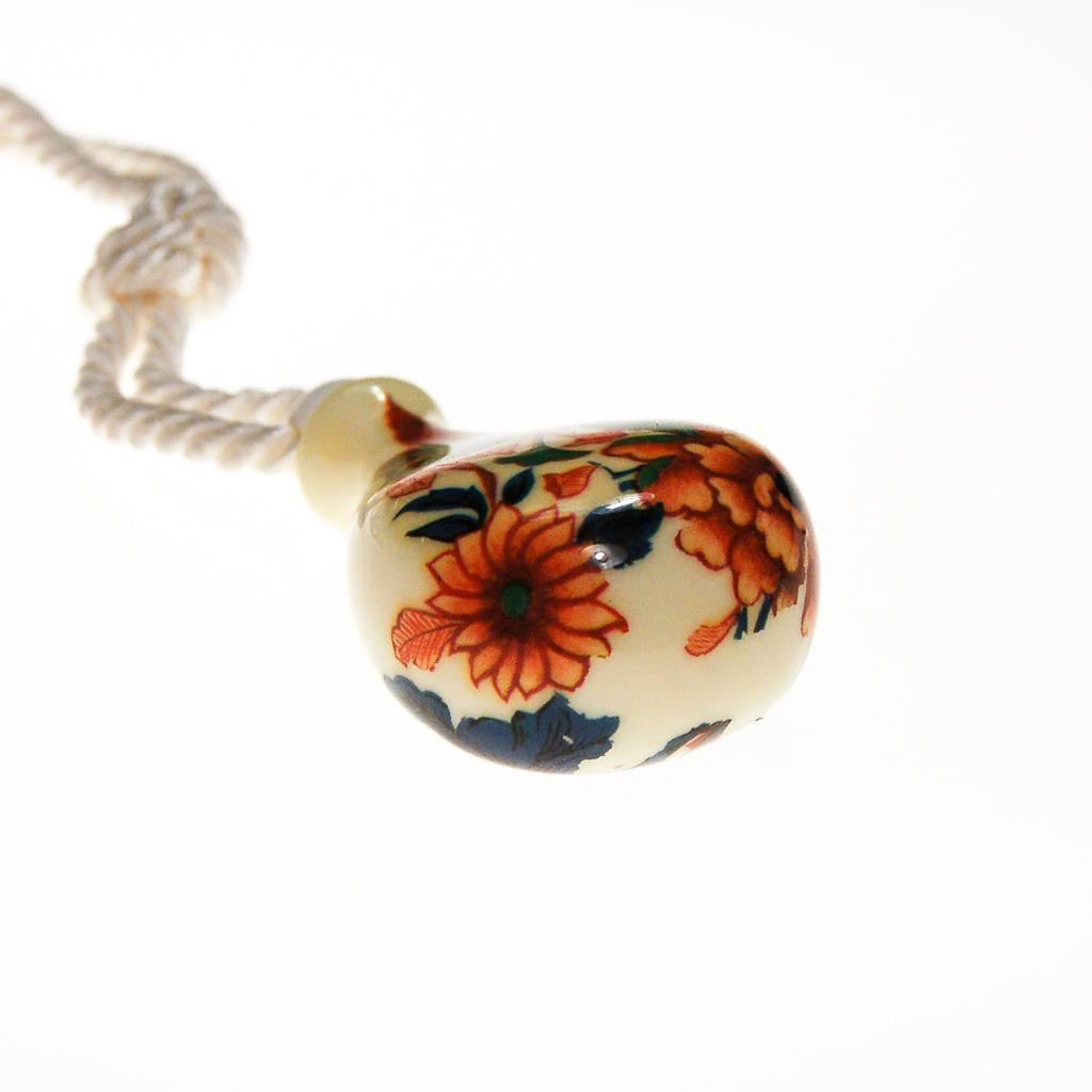 Diane von Furstenberg Floral Urn Pendant Statement Necklace by Diane von Furstenberg - Vintage Meet Modern Vintage Jewelry - Chicago, Illinois - #oldhollywoodglamour #vintagemeetmodern #designervintage #jewelrybox #antiquejewelry #vintagejewelry