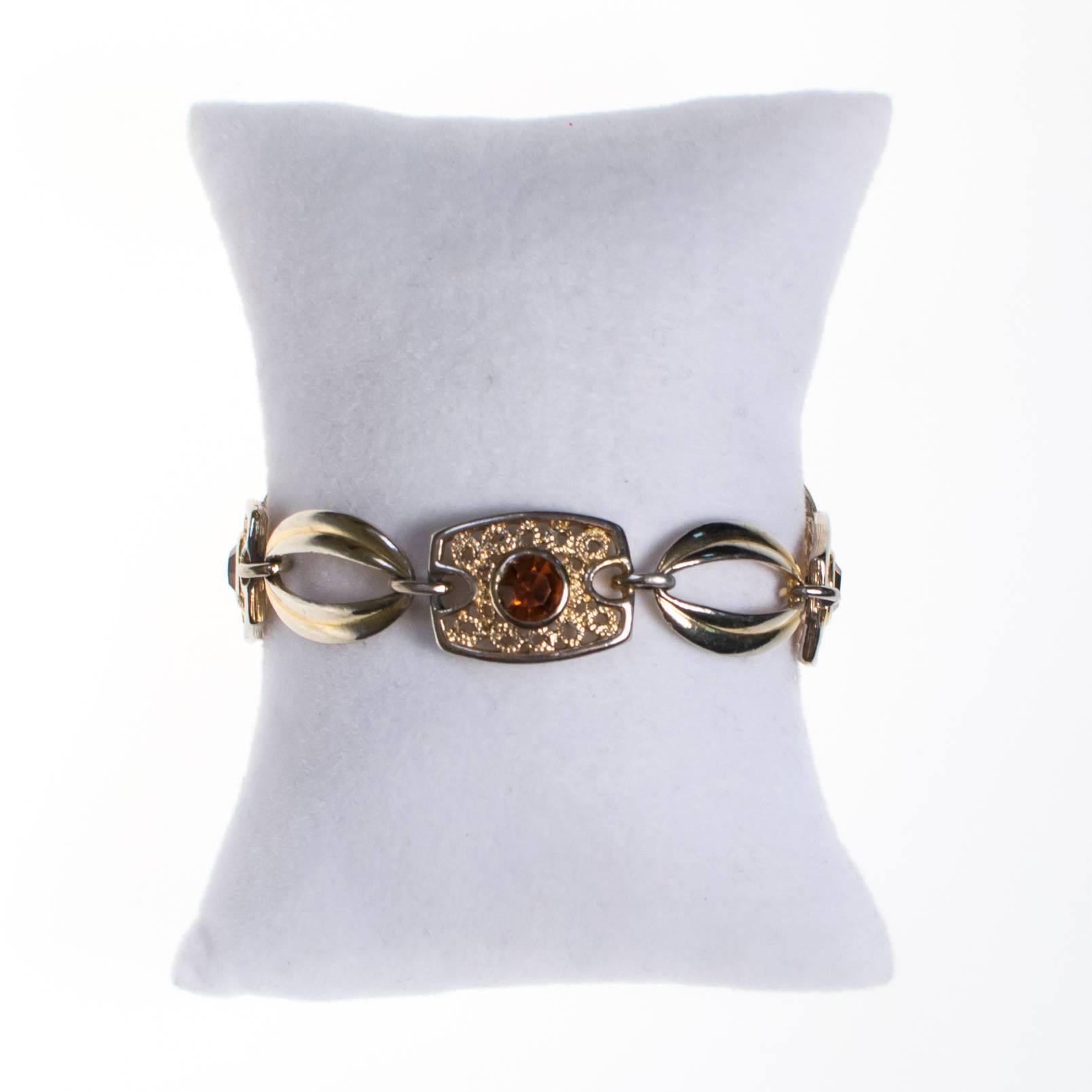 Sarah Coventry Amber Topaz Crystal and Filigree Link Panel Bracelet by Sarah Coventry - Vintage Meet Modern Vintage Jewelry - Chicago, Illinois - #oldhollywoodglamour #vintagemeetmodern #designervintage #jewelrybox #antiquejewelry #vintagejewelry