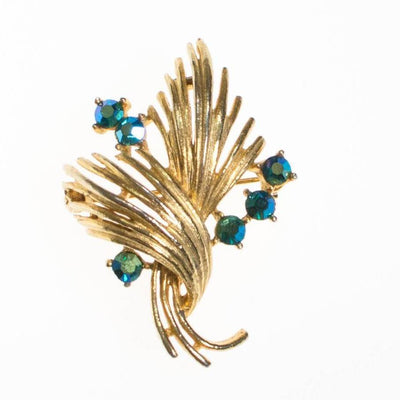 Vintage Lisner Gold Brooch with Peacock Blue Green Iridescent Rhinestones by Lisner - Vintage Meet Modern Vintage Jewelry - Chicago, Illinois - #oldhollywoodglamour #vintagemeetmodern #designervintage #jewelrybox #antiquejewelry #vintagejewelry
