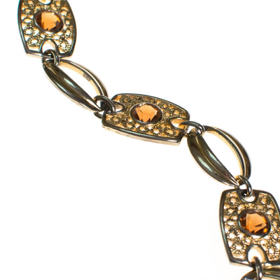Sarah Coventry Amber Topaz Crystal and Filigree Link Panel Bracelet by Sarah Coventry - Vintage Meet Modern Vintage Jewelry - Chicago, Illinois - #oldhollywoodglamour #vintagemeetmodern #designervintage #jewelrybox #antiquejewelry #vintagejewelry