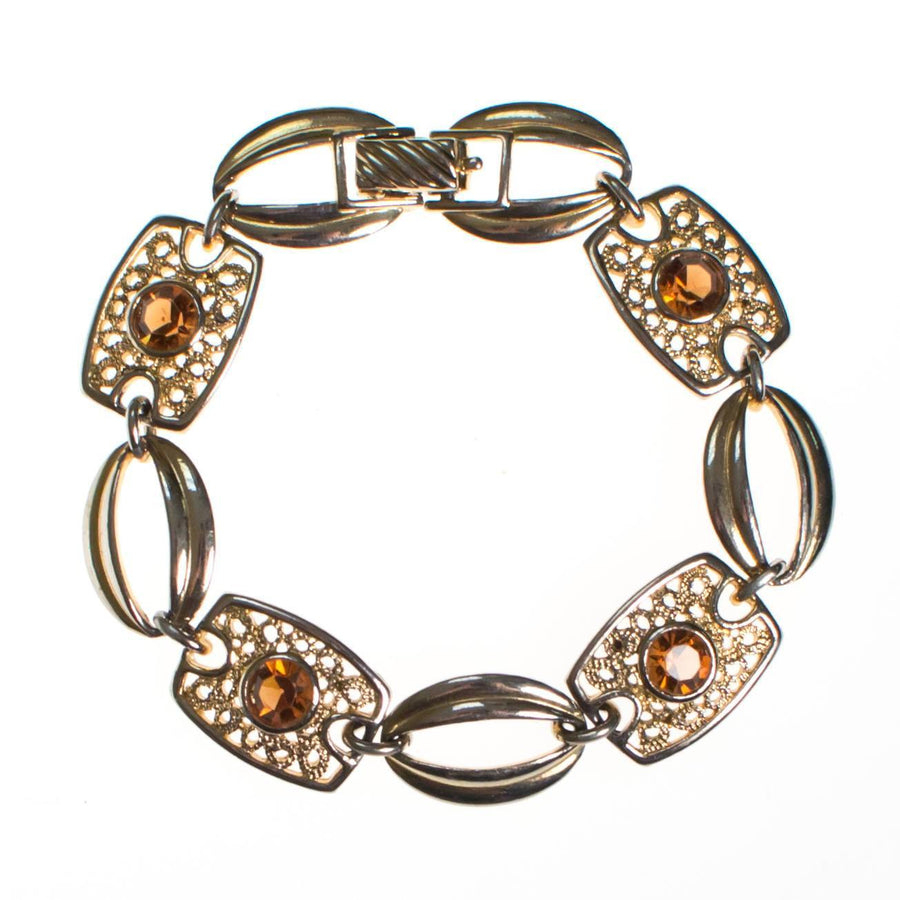 Sarah Coventry Amber Topaz Crystal and Filigree Link Panel Bracelet by Sarah Coventry - Vintage Meet Modern Vintage Jewelry - Chicago, Illinois - #oldhollywoodglamour #vintagemeetmodern #designervintage #jewelrybox #antiquejewelry #vintagejewelry