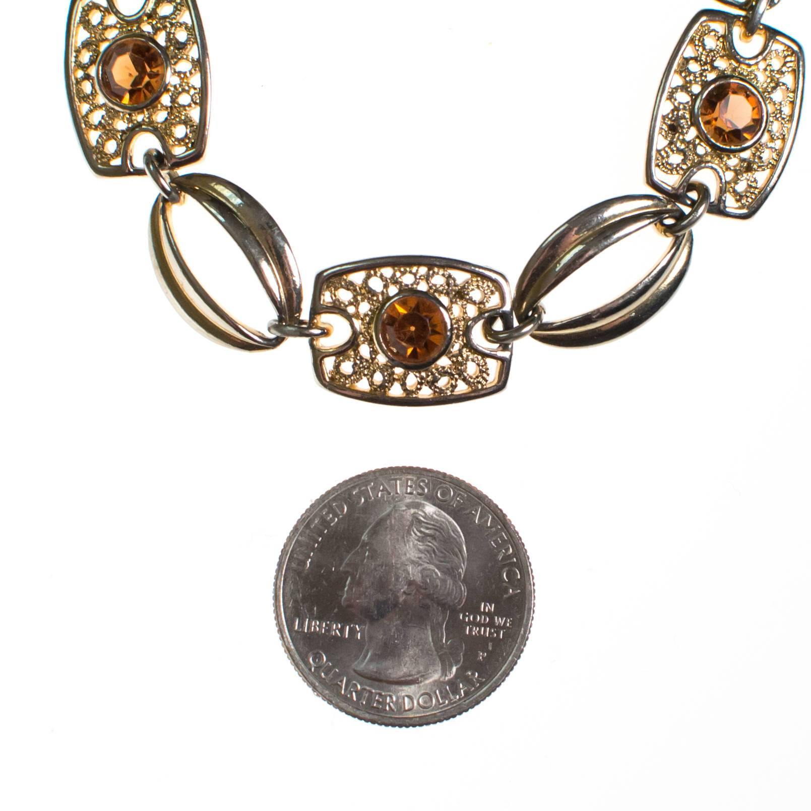 Sarah Coventry Amber Topaz Crystal and Filigree Link Panel Bracelet by Sarah Coventry - Vintage Meet Modern Vintage Jewelry - Chicago, Illinois - #oldhollywoodglamour #vintagemeetmodern #designervintage #jewelrybox #antiquejewelry #vintagejewelry