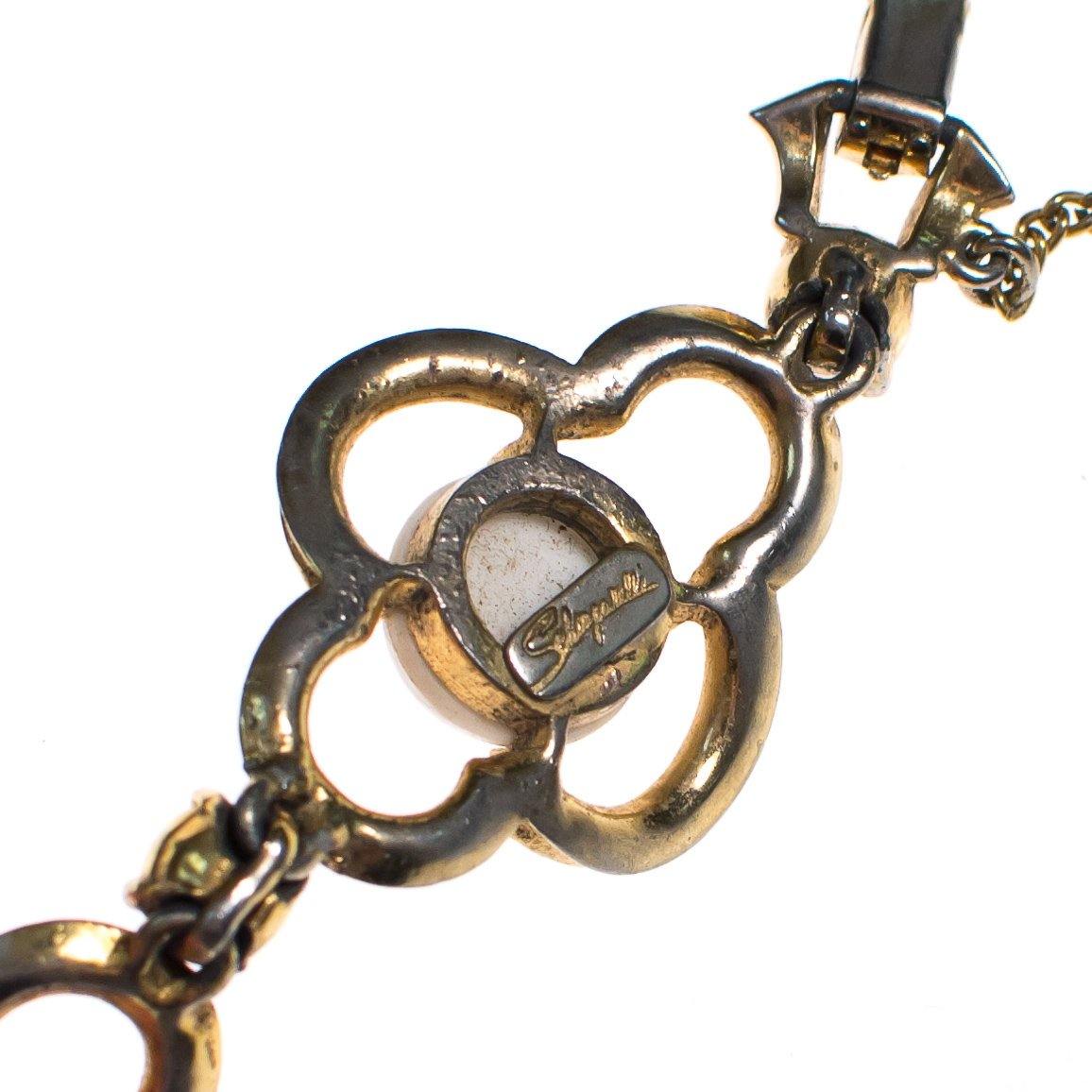 Vintage Schiaparelli Milk Glass with Pink Rose Quatrafoil Link Bracelet with Pink Rhinestones by Schiaparelli - Vintage Meet Modern Vintage Jewelry - Chicago, Illinois - #oldhollywoodglamour #vintagemeetmodern #designervintage #jewelrybox #antiquejewelry #vintagejewelry