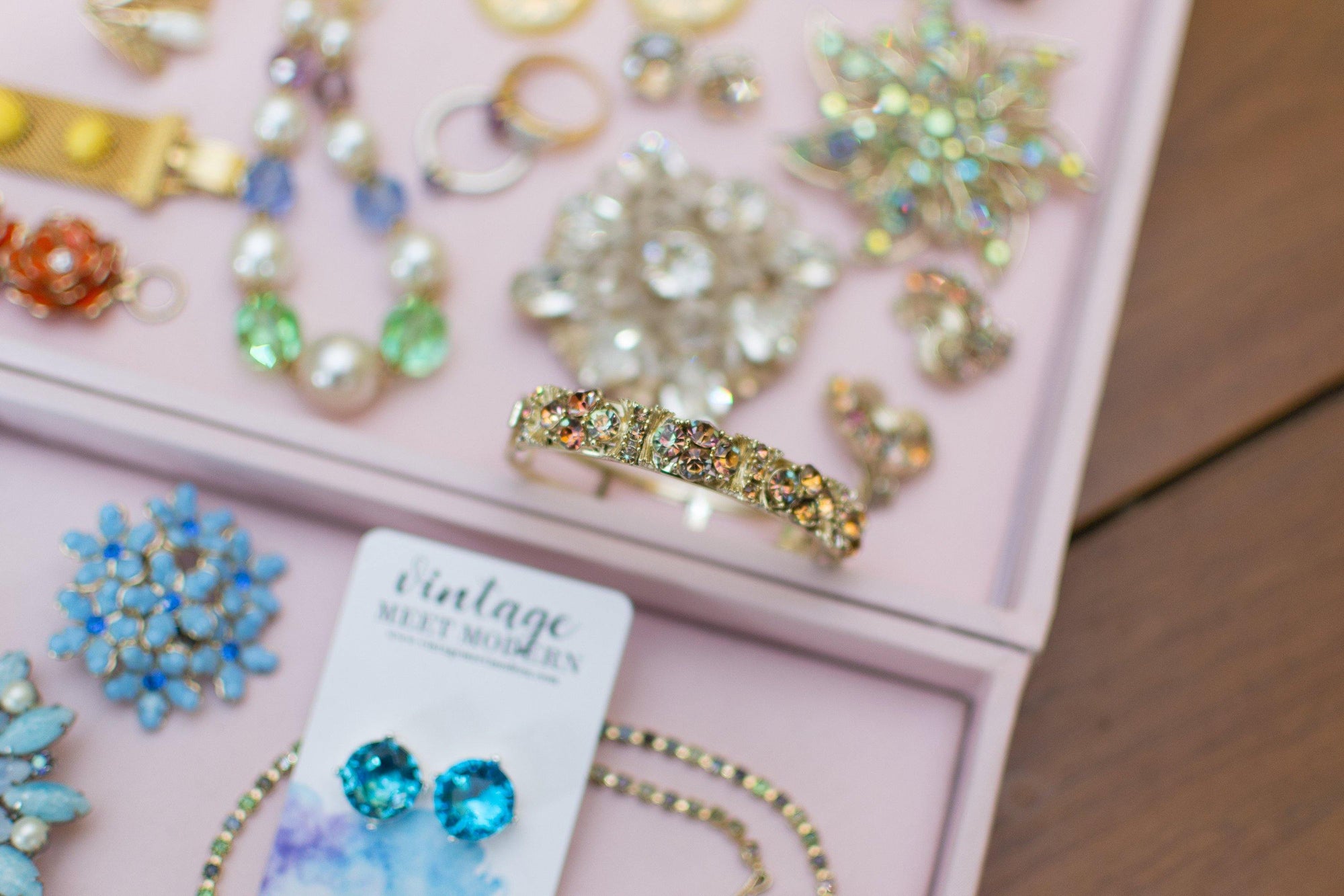 Vintage Lisner Hinged Bangle Bracelet with Citrine and Topaz Crystal Rhinestones by Lisner Hinged - Vintage Meet Modern Vintage Jewelry - Chicago, Illinois - #oldhollywoodglamour #vintagemeetmodern #designervintage #jewelrybox #antiquejewelry #vintagejewelry