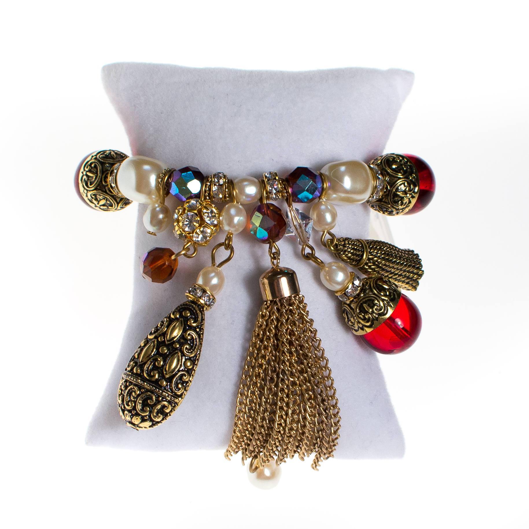 Garnet Crystal, Pearl, Rhinestone, and Gold Tassel Charm Bracelet by 1980s - Vintage Meet Modern Vintage Jewelry - Chicago, Illinois - #oldhollywoodglamour #vintagemeetmodern #designervintage #jewelrybox #antiquejewelry #vintagejewelry