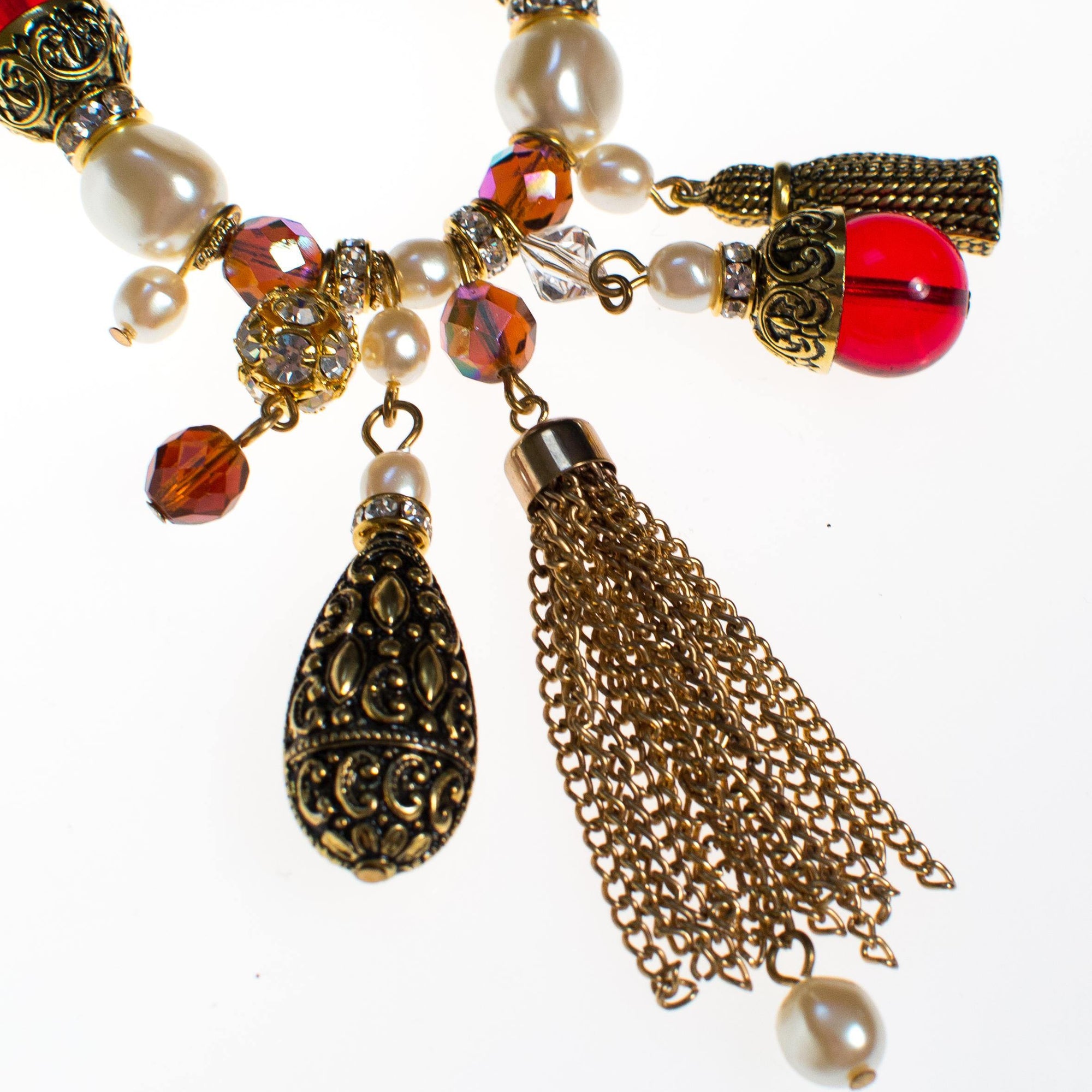Garnet Crystal, Pearl, Rhinestone, and Gold Tassel Charm Bracelet by 1980s - Vintage Meet Modern Vintage Jewelry - Chicago, Illinois - #oldhollywoodglamour #vintagemeetmodern #designervintage #jewelrybox #antiquejewelry #vintagejewelry