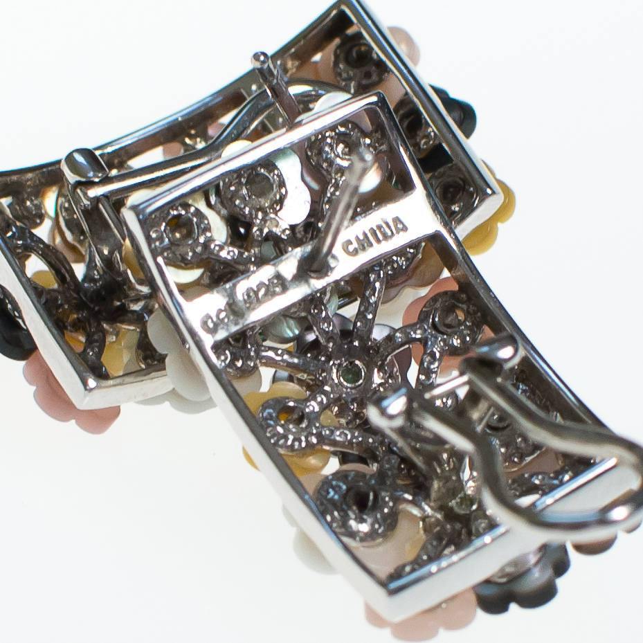 Vintage Mother of Pearl Flower Lever Back Earrings Set In Sterling Silver by Mother of Pearl Flower - Vintage Meet Modern Vintage Jewelry - Chicago, Illinois - #oldhollywoodglamour #vintagemeetmodern #designervintage #jewelrybox #antiquejewelry #vintagejewelry