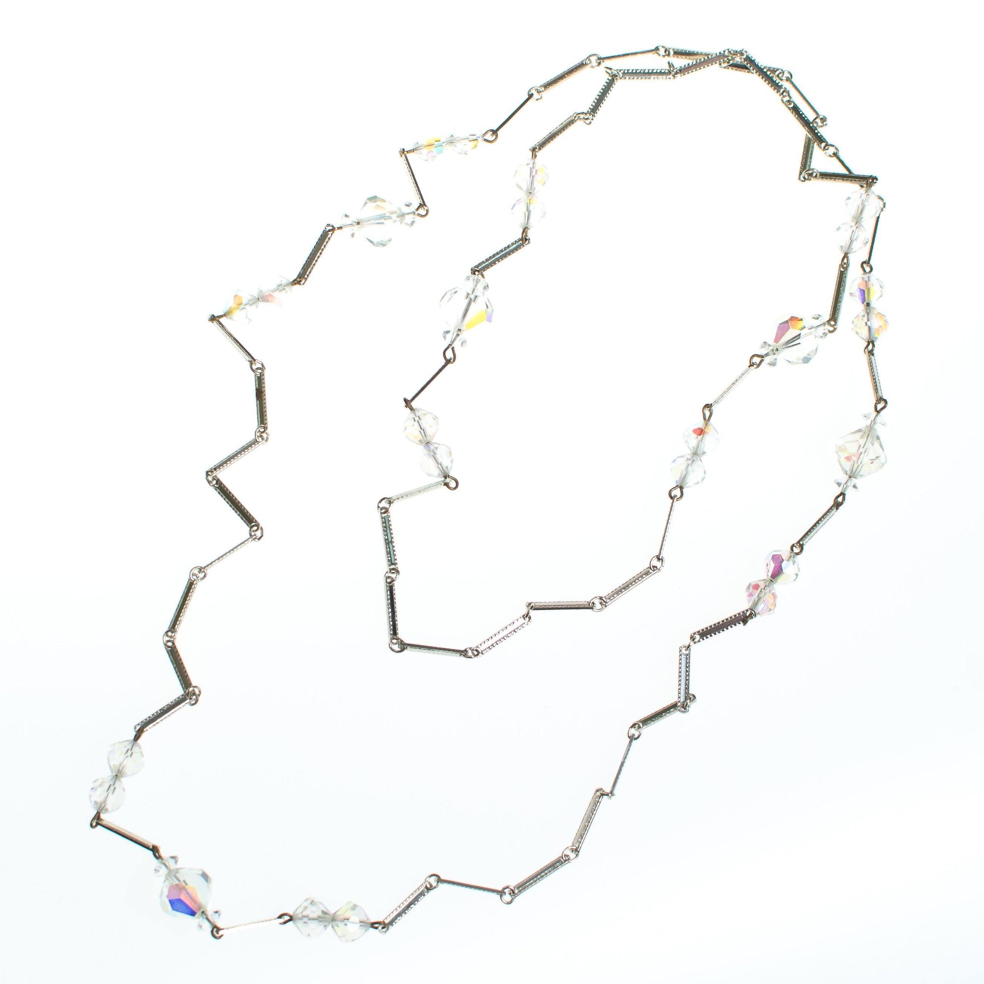 Vintage Aurora Borealis Crystal and Silver Long Flat Link Chain Necklace by Aurora Borealis - Vintage Meet Modern Vintage Jewelry - Chicago, Illinois - #oldhollywoodglamour #vintagemeetmodern #designervintage #jewelrybox #antiquejewelry #vintagejewelry