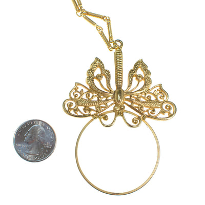Vintage Accessocraft NYC Butterfly Magnify Glass Necklace by Accessocraft NYC - Vintage Meet Modern Vintage Jewelry - Chicago, Illinois - #oldhollywoodglamour #vintagemeetmodern #designervintage #jewelrybox #antiquejewelry #vintagejewelry
