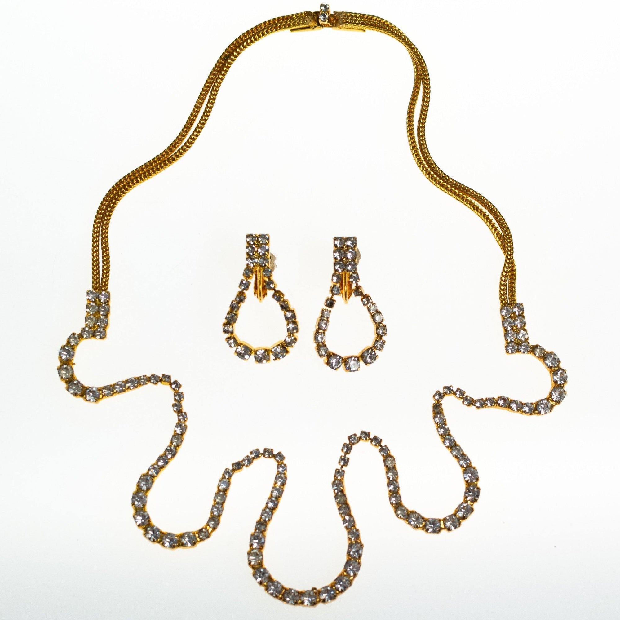 Vintage Hobe Earrings, Clear Crystal Rhinestones, Gold Tone Earrings, Dangle Loops, Clip with Screw Back by Hobe - Vintage Meet Modern Vintage Jewelry - Chicago, Illinois - #oldhollywoodglamour #vintagemeetmodern #designervintage #jewelrybox #antiquejewelry #vintagejewelry