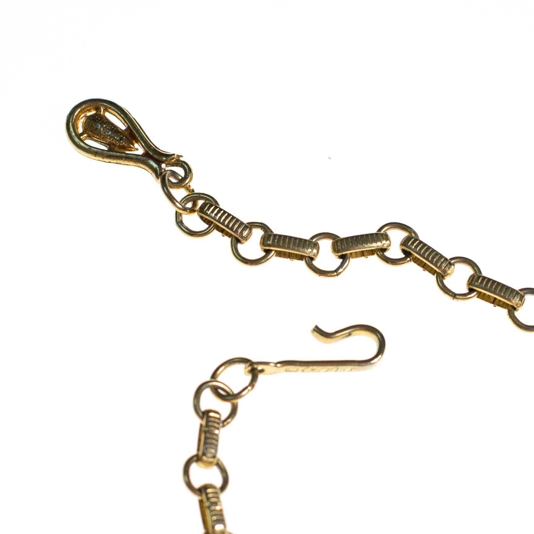 Vintage 1960s Gold Swirl Link Necklace with Rhinestones by 1960s - Vintage Meet Modern Vintage Jewelry - Chicago, Illinois - #oldhollywoodglamour #vintagemeetmodern #designervintage #jewelrybox #antiquejewelry #vintagejewelry