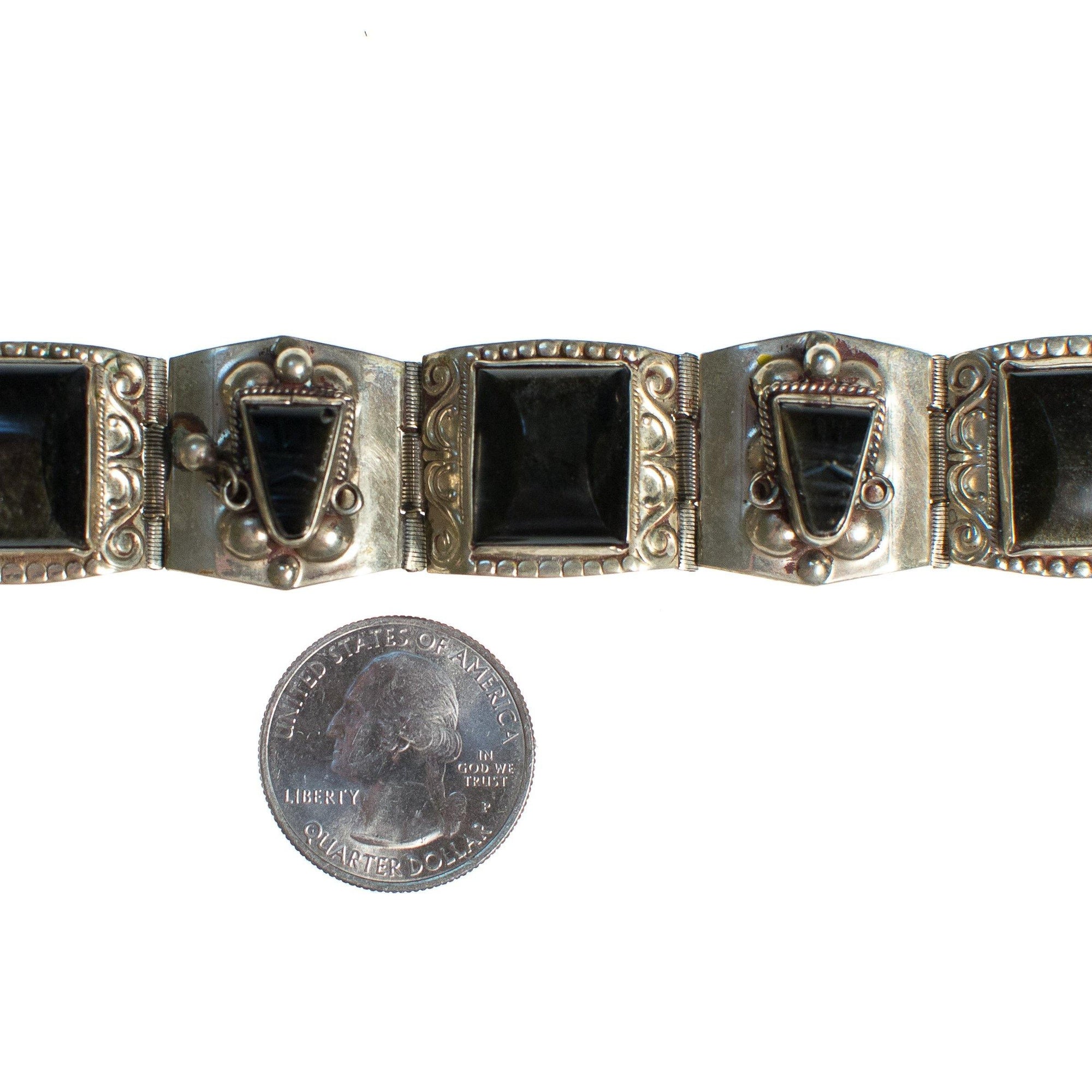 Vintage Made in Mexico Brown Agate Carved Faces Panel Alpaca Bracelet by Made in Mexico - Vintage Meet Modern Vintage Jewelry - Chicago, Illinois - #oldhollywoodglamour #vintagemeetmodern #designervintage #jewelrybox #antiquejewelry #vintagejewelry