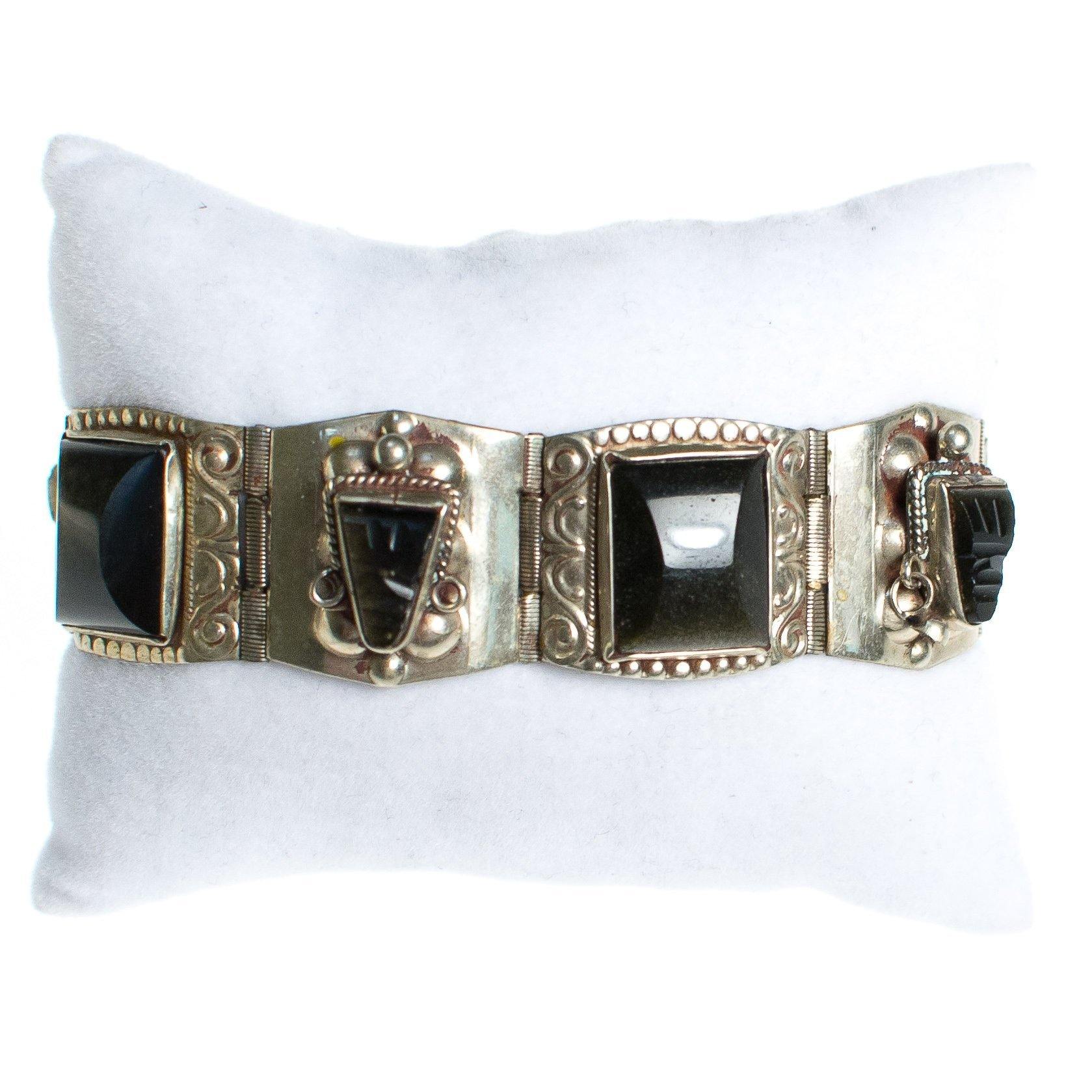 Vintage Made in Mexico Brown Agate Carved Faces Panel Alpaca Bracelet by Made in Mexico - Vintage Meet Modern Vintage Jewelry - Chicago, Illinois - #oldhollywoodglamour #vintagemeetmodern #designervintage #jewelrybox #antiquejewelry #vintagejewelry