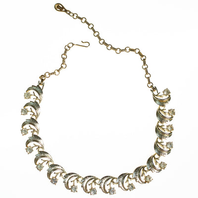 Vintage 1960s Gold Swirl Link Necklace with Rhinestones by 1960s - Vintage Meet Modern Vintage Jewelry - Chicago, Illinois - #oldhollywoodglamour #vintagemeetmodern #designervintage #jewelrybox #antiquejewelry #vintagejewelry
