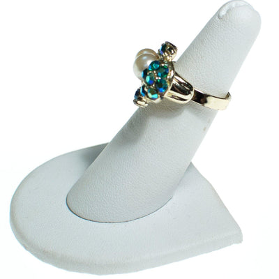 Vintage 1960s Faux Pearl and Green Blue Iridescent Aurora Borealis Adjustable Cocktail Statement Ring by 1960s - Vintage Meet Modern Vintage Jewelry - Chicago, Illinois - #oldhollywoodglamour #vintagemeetmodern #designervintage #jewelrybox #antiquejewelry #vintagejewelry