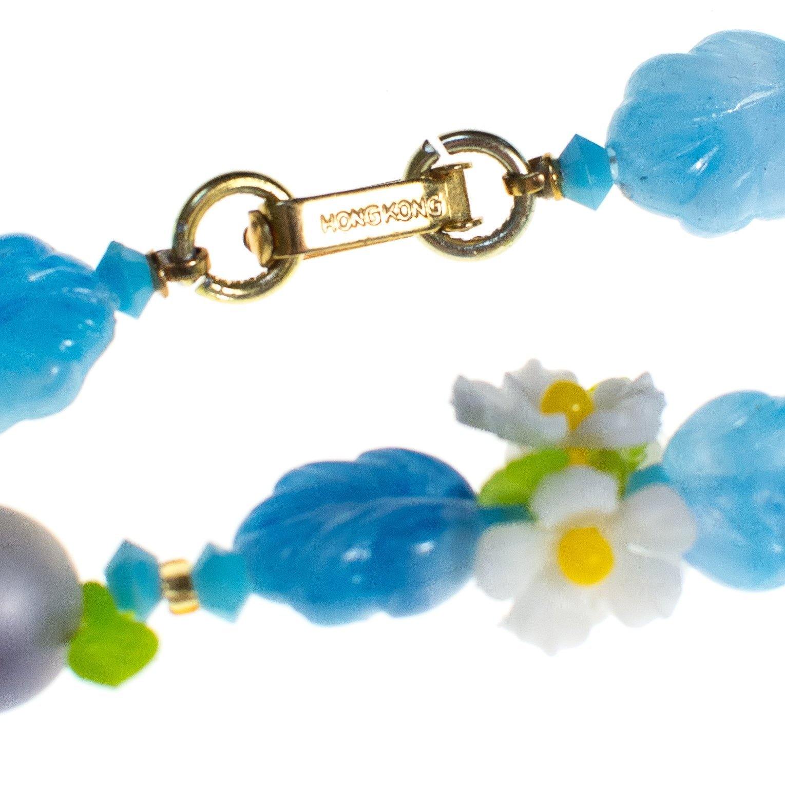 Vintage 1950s Blue Bead and Daisy Lucite Double Strand Beaded Necklace by 1950s - Vintage Meet Modern Vintage Jewelry - Chicago, Illinois - #oldhollywoodglamour #vintagemeetmodern #designervintage #jewelrybox #antiquejewelry #vintagejewelry