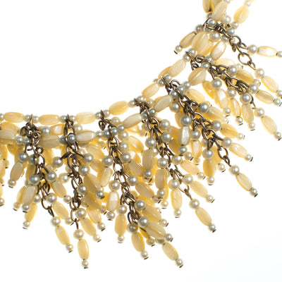 Vintage 1940s Designer Castlecliff Champagne Mother of Pearl Fringed Beaded Bib Statement Necklace by Castlecliff - Vintage Meet Modern Vintage Jewelry - Chicago, Illinois - #oldhollywoodglamour #vintagemeetmodern #designervintage #jewelrybox #antiquejewelry #vintagejewelry