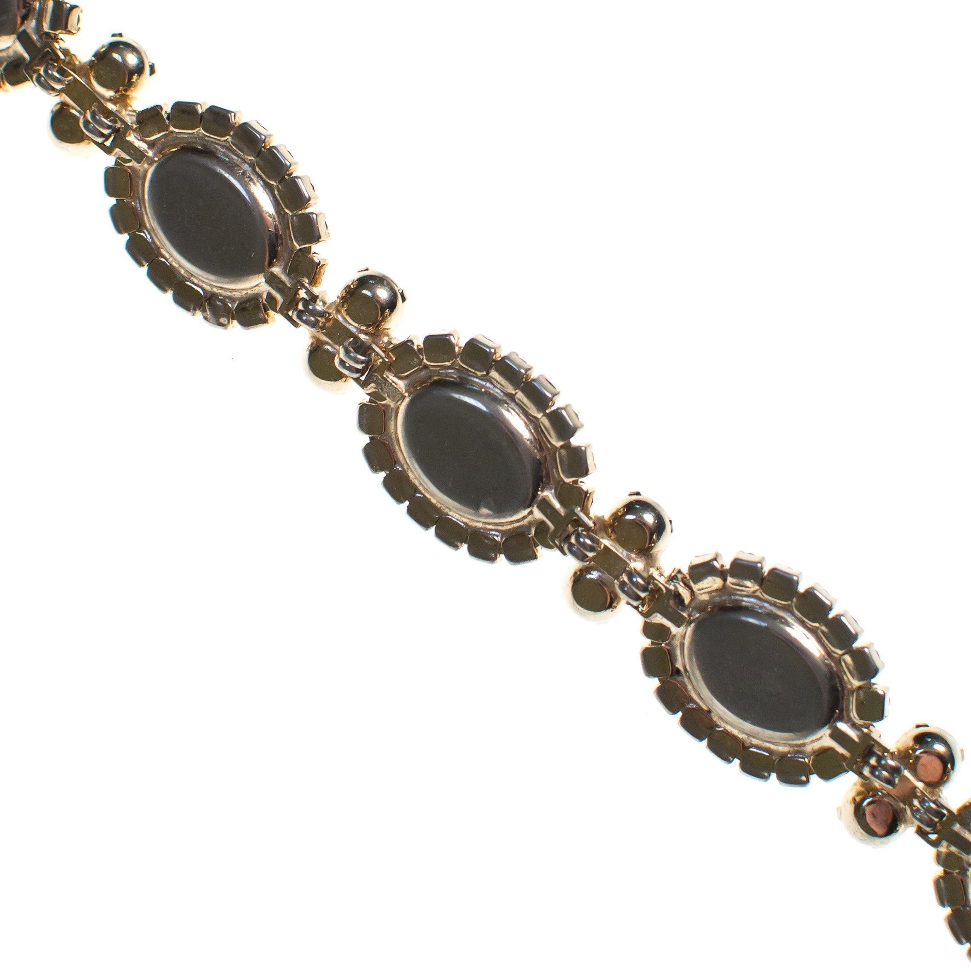 Vintage Hattie Carnegie Gold Tone Bracelet, White Gemstones, Smoke Rhinestones by Hattie Carnegie - Vintage Meet Modern Vintage Jewelry - Chicago, Illinois - #oldhollywoodglamour #vintagemeetmodern #designervintage #jewelrybox #antiquejewelry #vintagejewelry