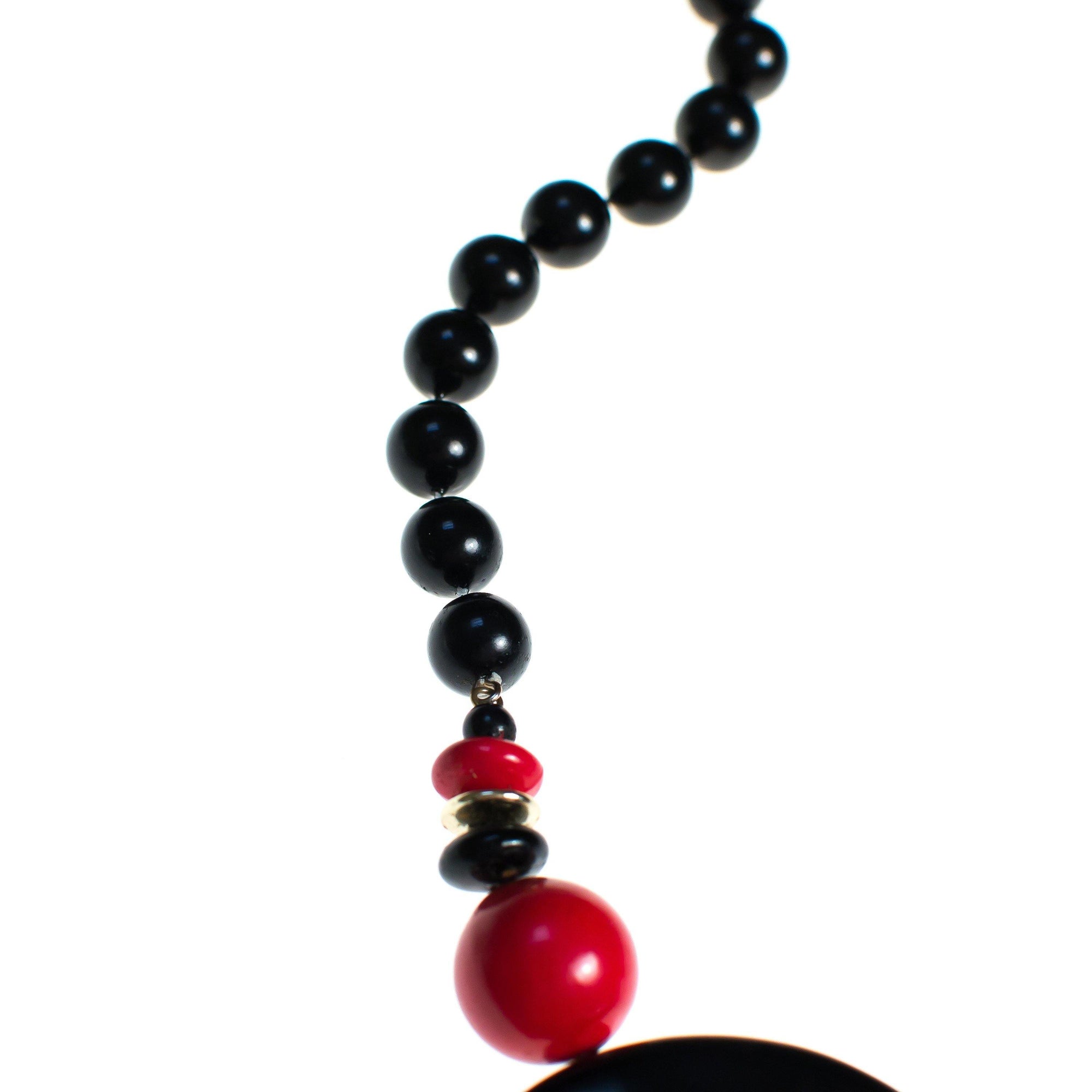 Vintage 1970s Black Gold and Red Medallion Necklace by 1970s - Vintage Meet Modern Vintage Jewelry - Chicago, Illinois - #oldhollywoodglamour #vintagemeetmodern #designervintage #jewelrybox #antiquejewelry #vintagejewelry