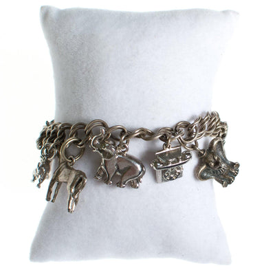 Vintage Silver Tone Charm Chunky Animal Charm Bracelet by 1960s - Vintage Meet Modern Vintage Jewelry - Chicago, Illinois - #oldhollywoodglamour #vintagemeetmodern #designervintage #jewelrybox #antiquejewelry #vintagejewelry