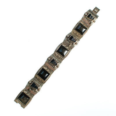 Vintage Made in Mexico Brown Agate Carved Faces Panel Alpaca Bracelet by Made in Mexico - Vintage Meet Modern Vintage Jewelry - Chicago, Illinois - #oldhollywoodglamour #vintagemeetmodern #designervintage #jewelrybox #antiquejewelry #vintagejewelry