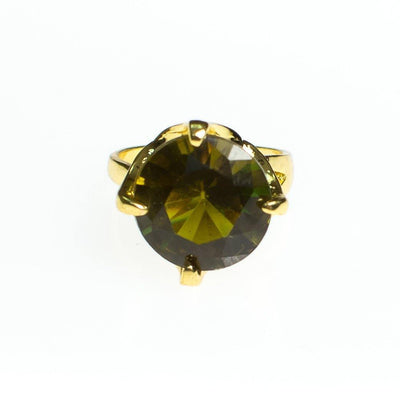 Vintage Olive Green Crystal Rhinestone Statement Ring, Gold Tone, Ring Size 9 by 1980s - Vintage Meet Modern Vintage Jewelry - Chicago, Illinois - #oldhollywoodglamour #vintagemeetmodern #designervintage #jewelrybox #antiquejewelry #vintagejewelry