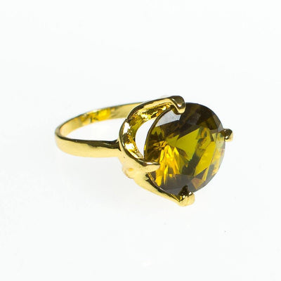 Vintage Olive Green Crystal Rhinestone Statement Ring, Gold Tone, Ring Size 9 by 1980s - Vintage Meet Modern Vintage Jewelry - Chicago, Illinois - #oldhollywoodglamour #vintagemeetmodern #designervintage #jewelrybox #antiquejewelry #vintagejewelry