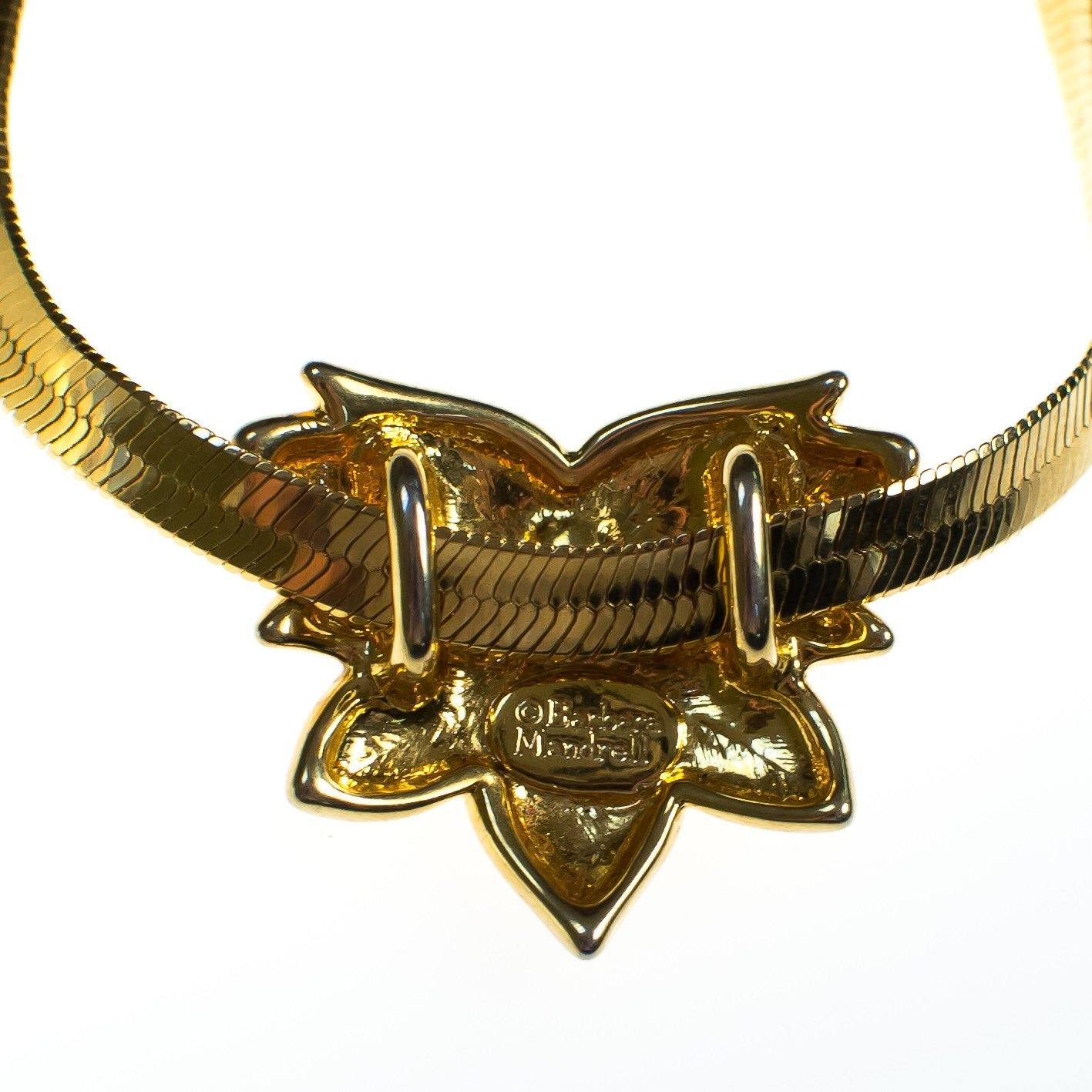 Vintage Barbara Mandrell Gold Slide Pendant with Emerald Crystal Long Gold Serpentine Chain Necklace by Barbara Mandrell - Vintage Meet Modern Vintage Jewelry - Chicago, Illinois - #oldhollywoodglamour #vintagemeetmodern #designervintage #jewelrybox #antiquejewelry #vintagejewelry