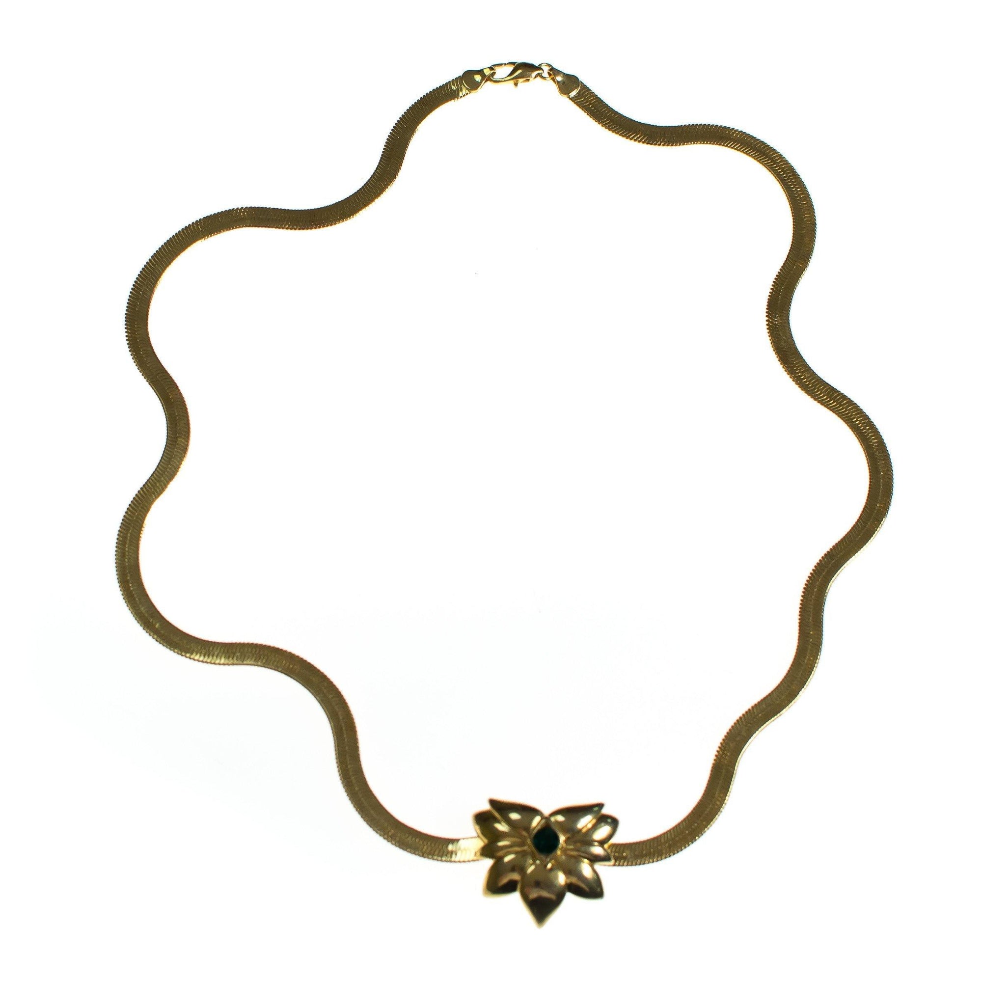 Vintage Barbara Mandrell Gold Slide Pendant with Emerald Crystal Long Gold Serpentine Chain Necklace by Barbara Mandrell - Vintage Meet Modern Vintage Jewelry - Chicago, Illinois - #oldhollywoodglamour #vintagemeetmodern #designervintage #jewelrybox #antiquejewelry #vintagejewelry