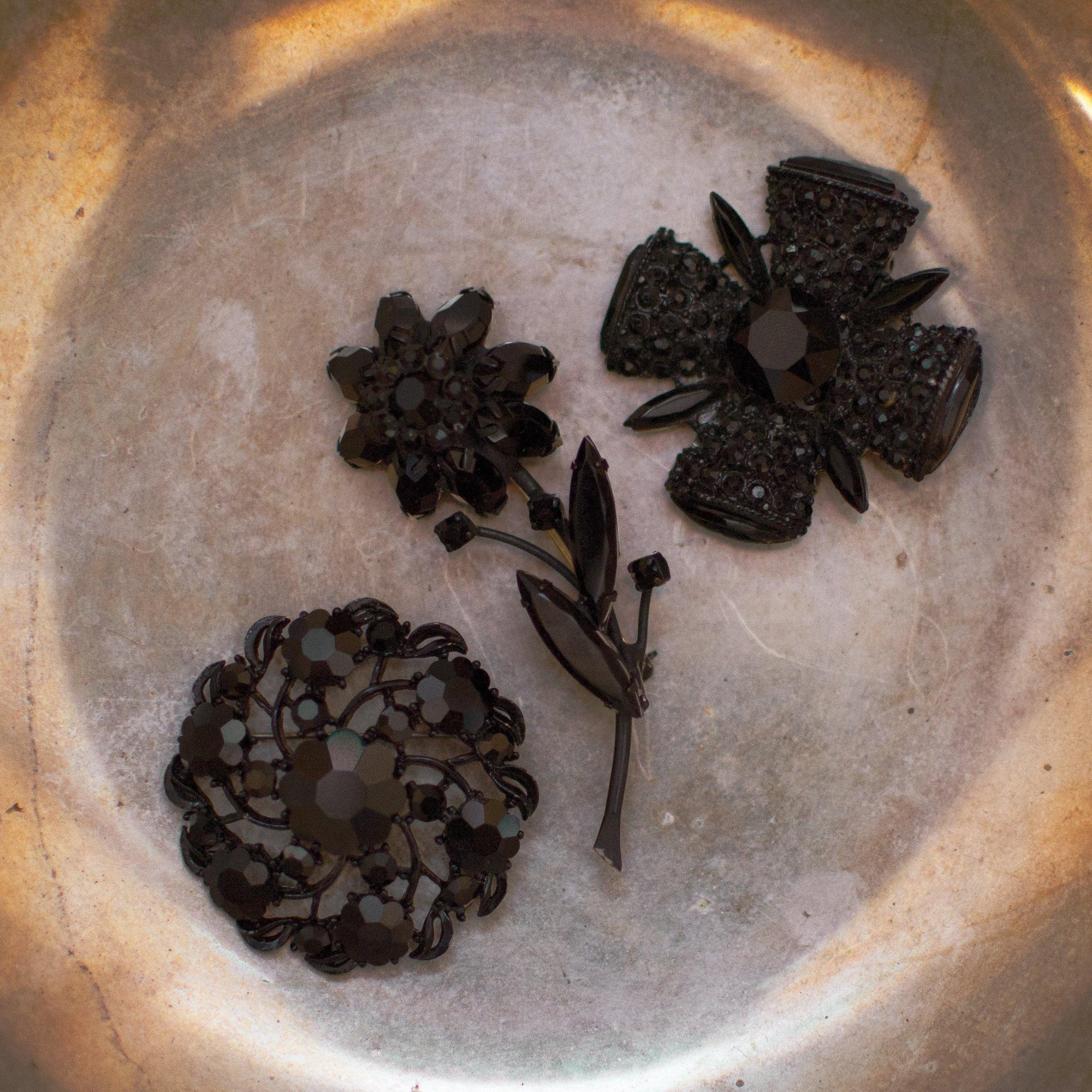 Vintage Black Jet Crystal Flower Brooch Pin Mid Century Modern by 1950s - Vintage Meet Modern Vintage Jewelry - Chicago, Illinois - #oldhollywoodglamour #vintagemeetmodern #designervintage #jewelrybox #antiquejewelry #vintagejewelry