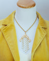 Vintage 1970s Bohemian Chic Waterfall Pearl Tassel Necklace by 1970s - Vintage Meet Modern Vintage Jewelry - Chicago, Illinois - #oldhollywoodglamour #vintagemeetmodern #designervintage #jewelrybox #antiquejewelry #vintagejewelry