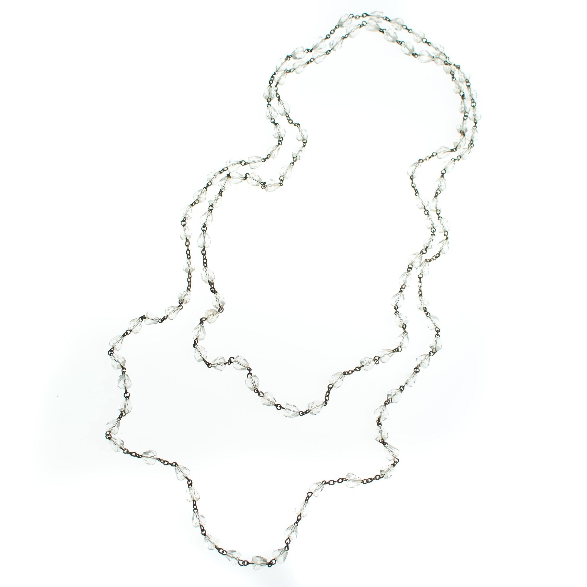 Vintage Art Deco Cut Crystal and Silver Sautoir Flapper Length Necklace by Art Deco - Vintage Meet Modern Vintage Jewelry - Chicago, Illinois - #oldhollywoodglamour #vintagemeetmodern #designervintage #jewelrybox #antiquejewelry #vintagejewelry