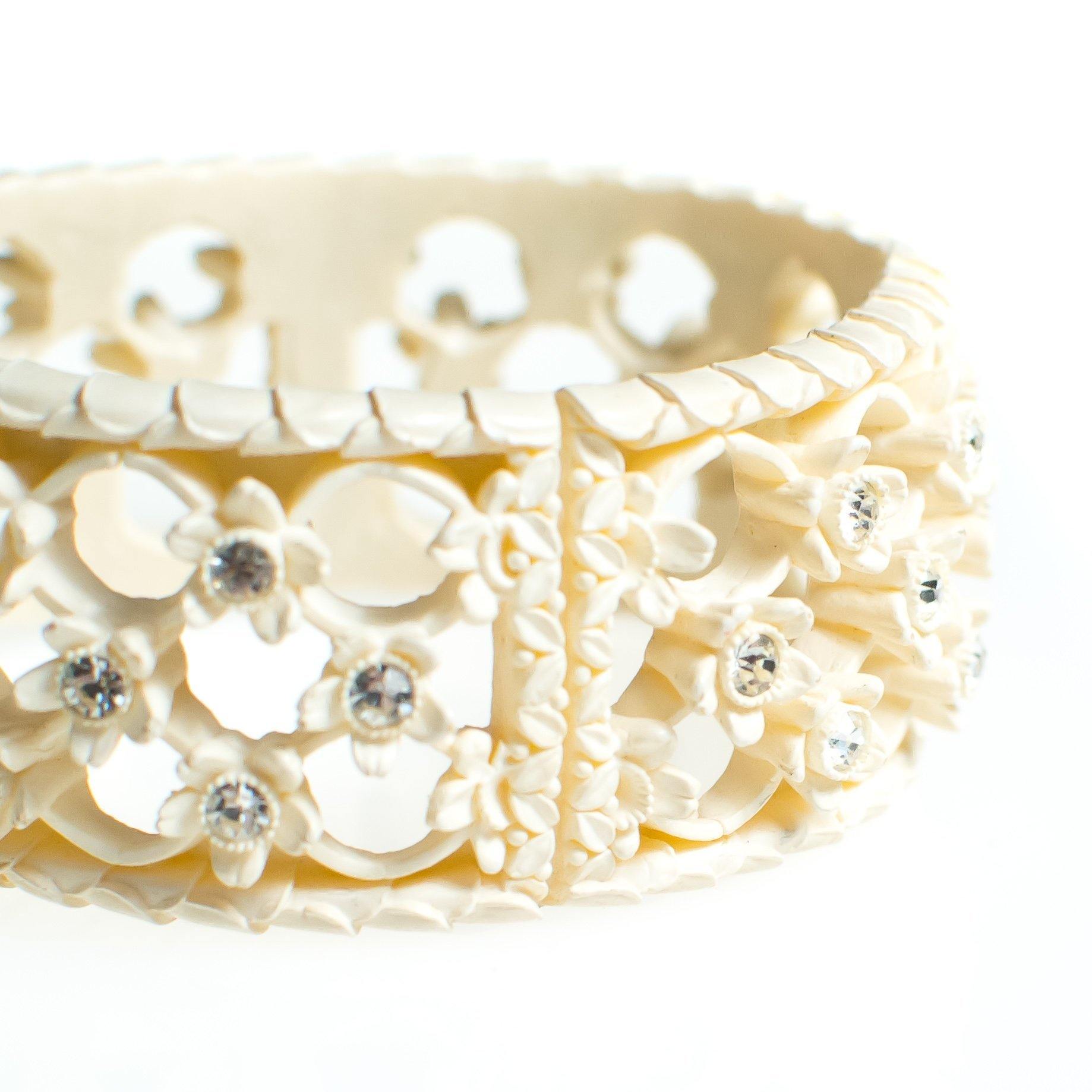 Vintage Ivory Cream Celluloide Flower Carved Hinged Clamper Bangle Bracelet with Rhinestones by Celluloide - Vintage Meet Modern Vintage Jewelry - Chicago, Illinois - #oldhollywoodglamour #vintagemeetmodern #designervintage #jewelrybox #antiquejewelry #vintagejewelry