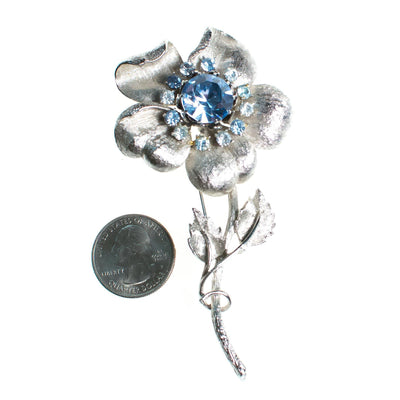 Vintage 1950s Coro Silver Flower Brooch with Light Blue Rhinestones, Silver Tone Setting, Brooches and Pins by Coro - Vintage Meet Modern Vintage Jewelry - Chicago, Illinois - #oldhollywoodglamour #vintagemeetmodern #designervintage #jewelrybox #antiquejewelry #vintagejewelry