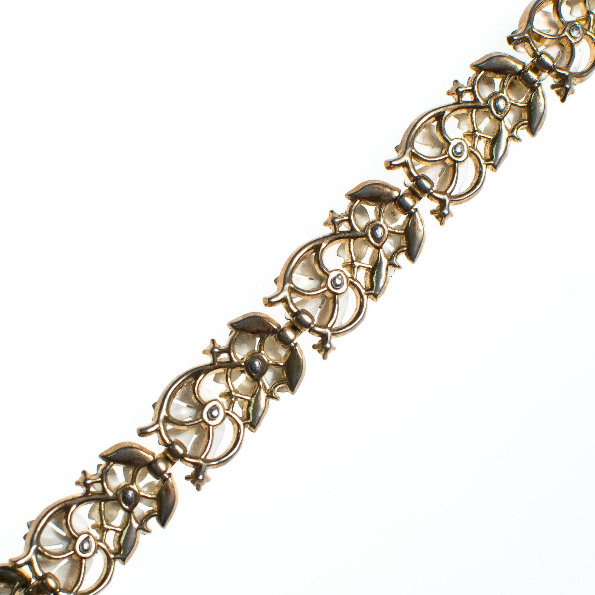 Vintage Crown Trifari White Flower with Rhinestones Bracelet, Gold Tone, White Flowers, CZ, Snap Lock Clasp by 1950s - Vintage Meet Modern Vintage Jewelry - Chicago, Illinois - #oldhollywoodglamour #vintagemeetmodern #designervintage #jewelrybox #antiquejewelry #vintagejewelry