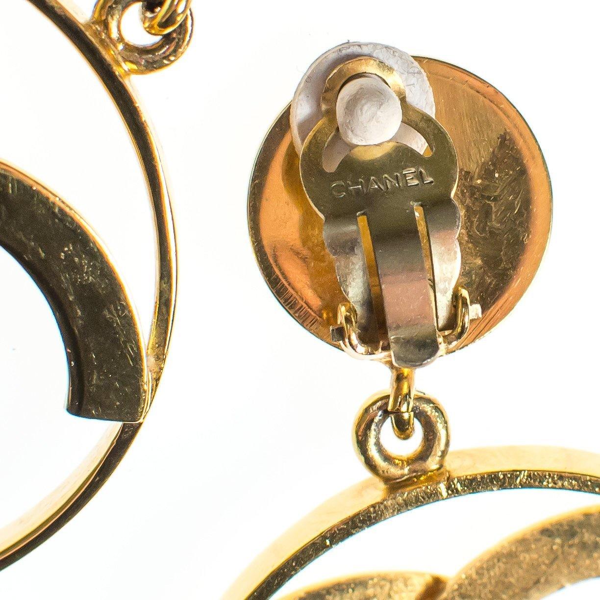 Vintage Gold Chanel CC Logo Statement Earrings by Chanel - Vintage Meet Modern Vintage Jewelry - Chicago, Illinois - #oldhollywoodglamour #vintagemeetmodern #designervintage #jewelrybox #antiquejewelry #vintagejewelry