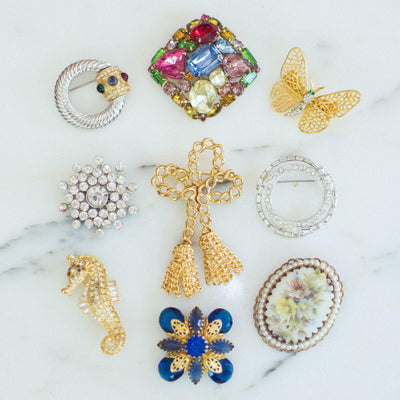 Vintage Capri Gold Butterfly Brooch with Pave Rhinestones and Emerald Crystal Eyes by Capri - Vintage Meet Modern Vintage Jewelry - Chicago, Illinois - #oldhollywoodglamour #vintagemeetmodern #designervintage #jewelrybox #antiquejewelry #vintagejewelry