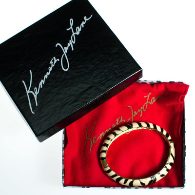 Kenneth Jay Lane Black and White Zebra Bangle Bracelet, Gold Tone by Kenneth Jay Lane - Vintage Meet Modern Vintage Jewelry - Chicago, Illinois - #oldhollywoodglamour #vintagemeetmodern #designervintage #jewelrybox #antiquejewelry #vintagejewelry