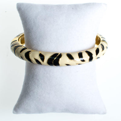 Kenneth Jay Lane Black and White Zebra Bangle Bracelet, Gold Tone by Kenneth Jay Lane - Vintage Meet Modern Vintage Jewelry - Chicago, Illinois - #oldhollywoodglamour #vintagemeetmodern #designervintage #jewelrybox #antiquejewelry #vintagejewelry