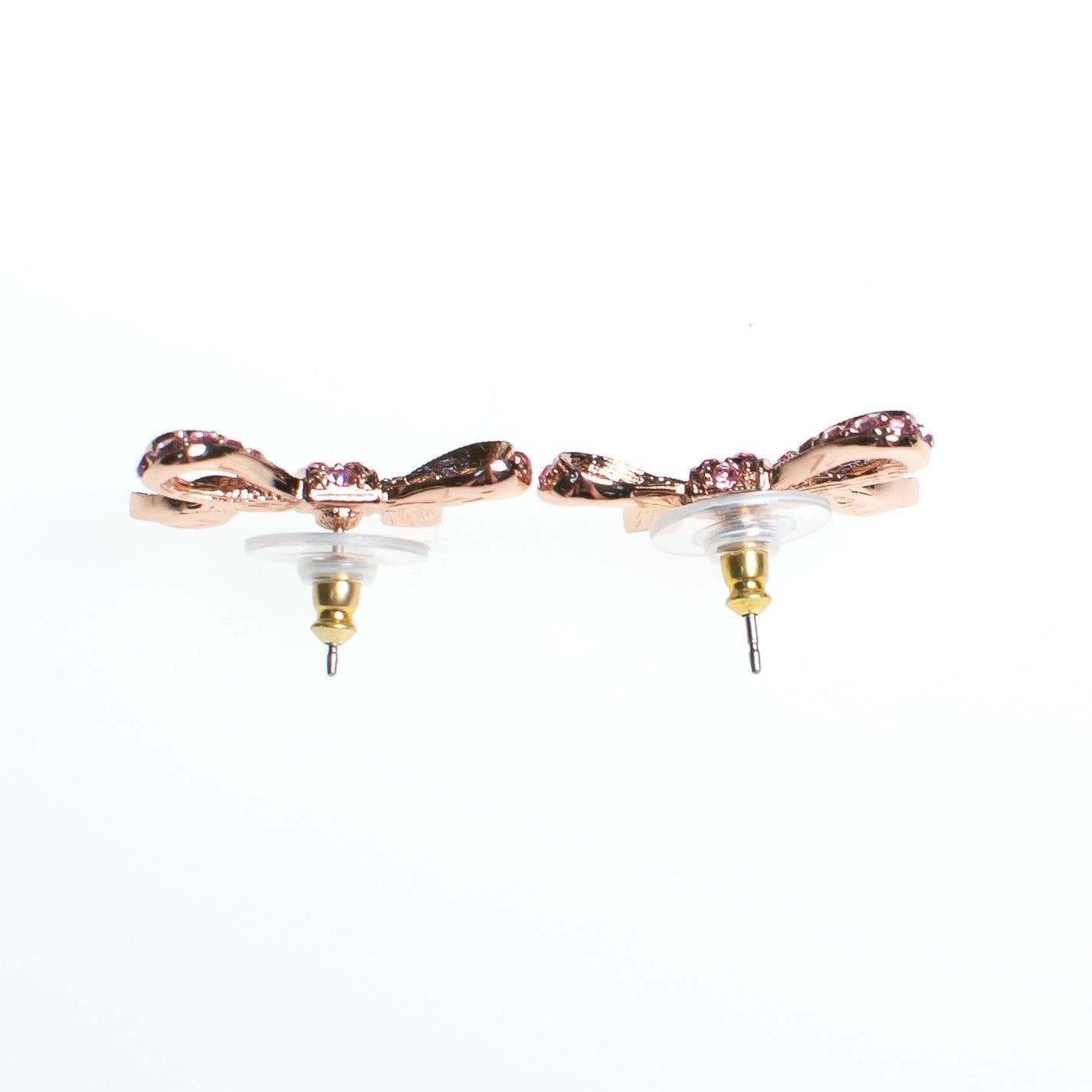 Vintage Kenneth Jay Lane Pink Rhinestone Bow Earrings, Pink Cancer Bow, Pink Rhinestones, Pierced by Kenneth Jay Lane - Vintage Meet Modern Vintage Jewelry - Chicago, Illinois - #oldhollywoodglamour #vintagemeetmodern #designervintage #jewelrybox #antiquejewelry #vintagejewelry