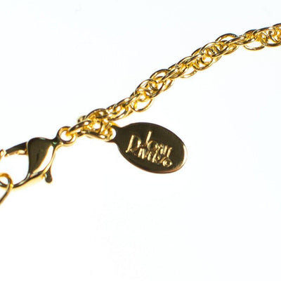 Vintage Joan Rivers Heart Imperia Egg Pendant Black Pendant with colorful Hearts Gold Tone Chain Lobster Clasp by Joan Rivers - Vintage Meet Modern Vintage Jewelry - Chicago, Illinois - #oldhollywoodglamour #vintagemeetmodern #designervintage #jewelrybox #antiquejewelry #vintagejewelry