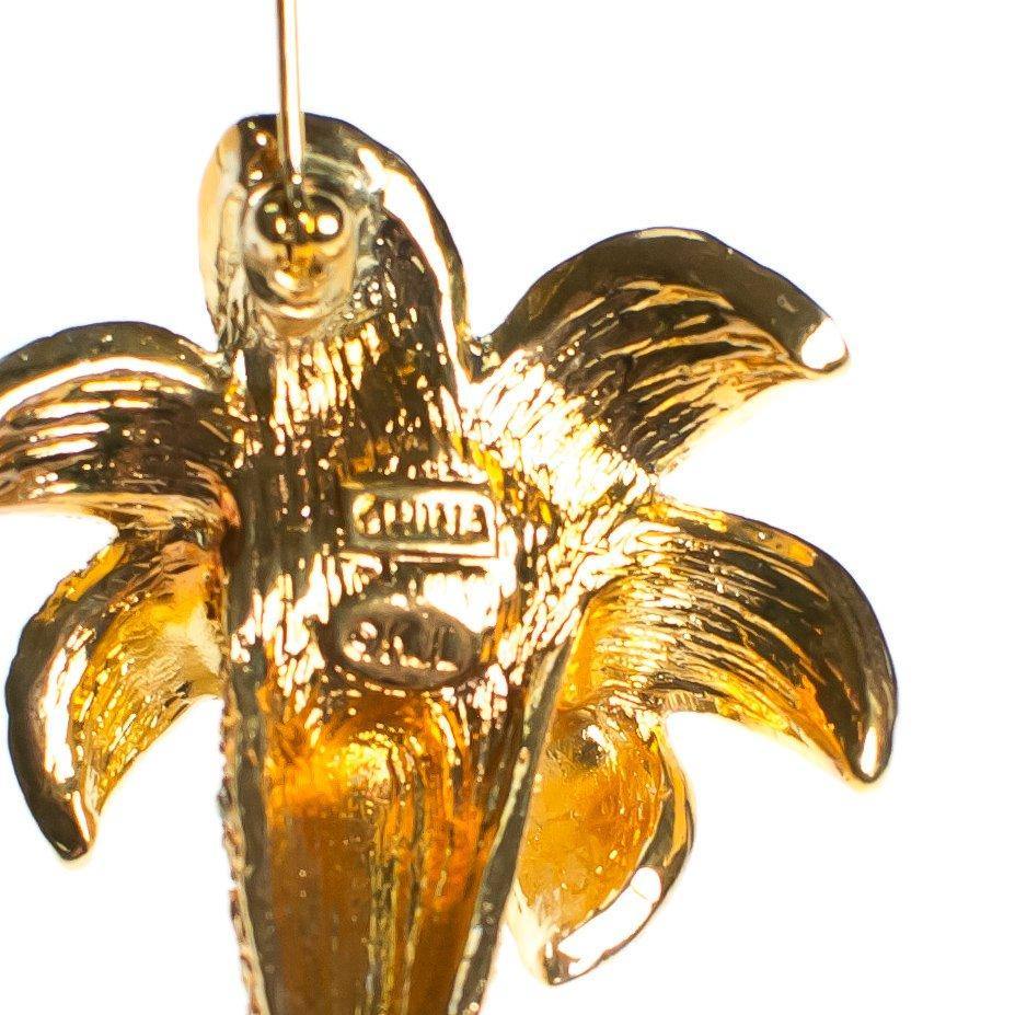 Vintage Kenneth Jay Lane Gilded Lily Flower Brooch, Gold and Silver Tone Setting, Diamante Crystals by Kenneth Jay Lane - Vintage Meet Modern Vintage Jewelry - Chicago, Illinois - #oldhollywoodglamour #vintagemeetmodern #designervintage #jewelrybox #antiquejewelry #vintagejewelry