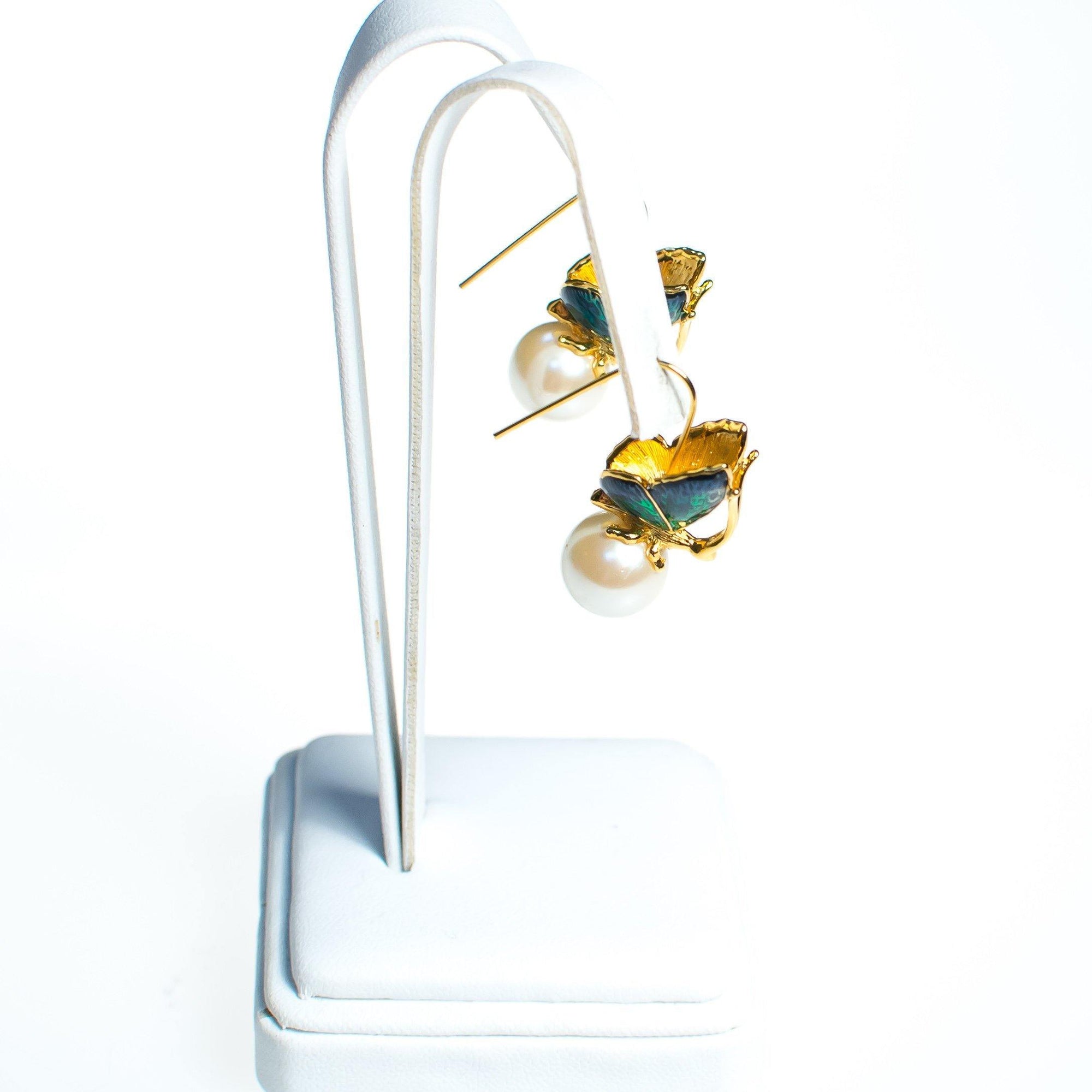 Vintage Kenneth Jay Lane Butterfly with Pearl Statement Earrings Wire Pierced by Kenneth Jay Lane - Vintage Meet Modern Vintage Jewelry - Chicago, Illinois - #oldhollywoodglamour #vintagemeetmodern #designervintage #jewelrybox #antiquejewelry #vintagejewelry