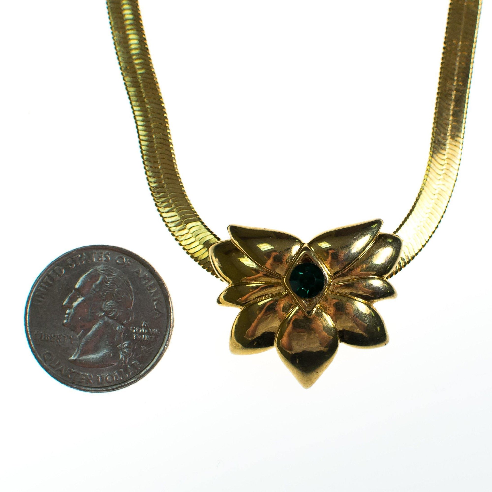 Vintage Barbara Mandrell Gold Slide Pendant with Emerald Crystal Long Gold Serpentine Chain Necklace by Barbara Mandrell - Vintage Meet Modern Vintage Jewelry - Chicago, Illinois - #oldhollywoodglamour #vintagemeetmodern #designervintage #jewelrybox #antiquejewelry #vintagejewelry