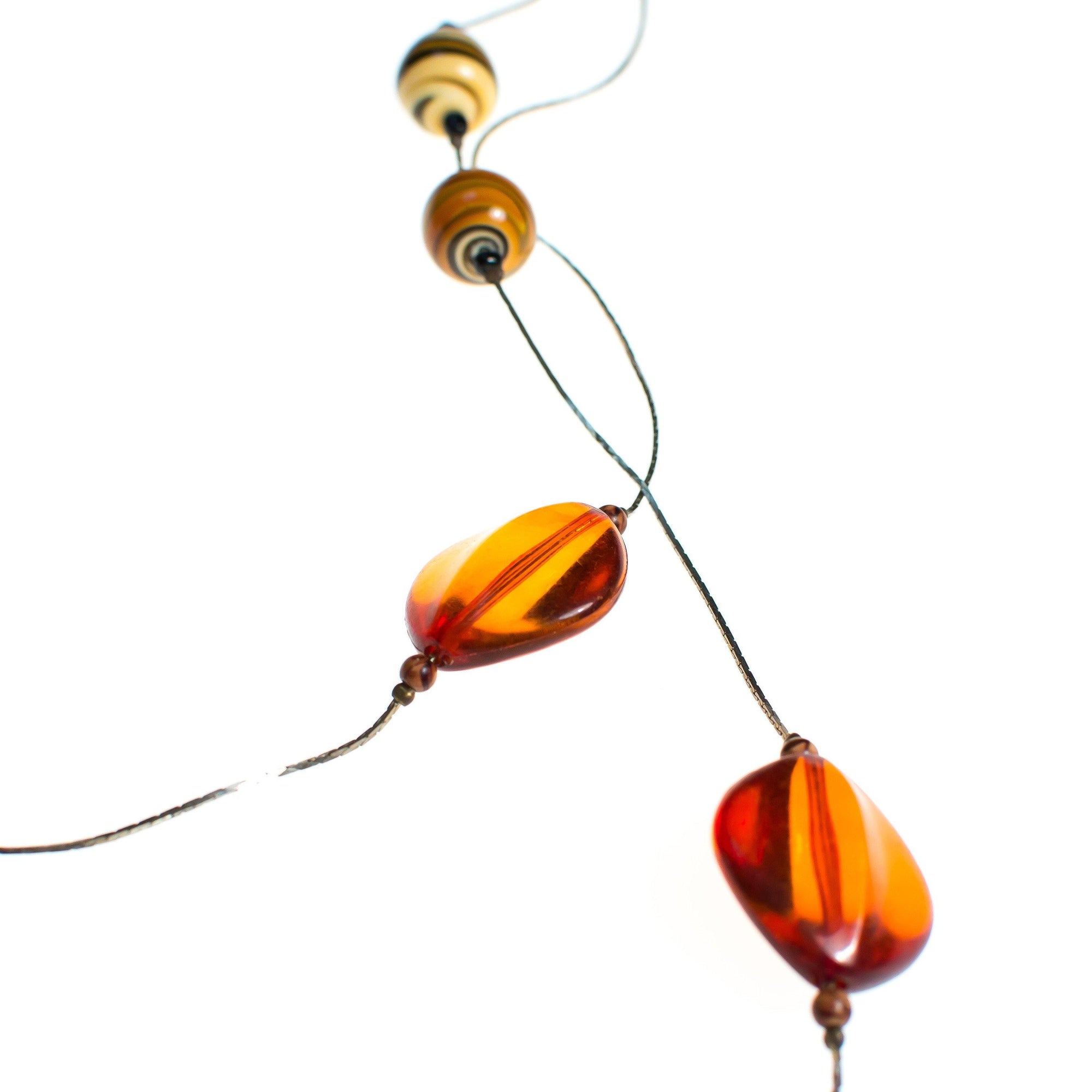 Vintage Sautoir Hand Blown Amber Glass Long Silver Necklace by 1980s - Vintage Meet Modern Vintage Jewelry - Chicago, Illinois - #oldhollywoodglamour #vintagemeetmodern #designervintage #jewelrybox #antiquejewelry #vintagejewelry